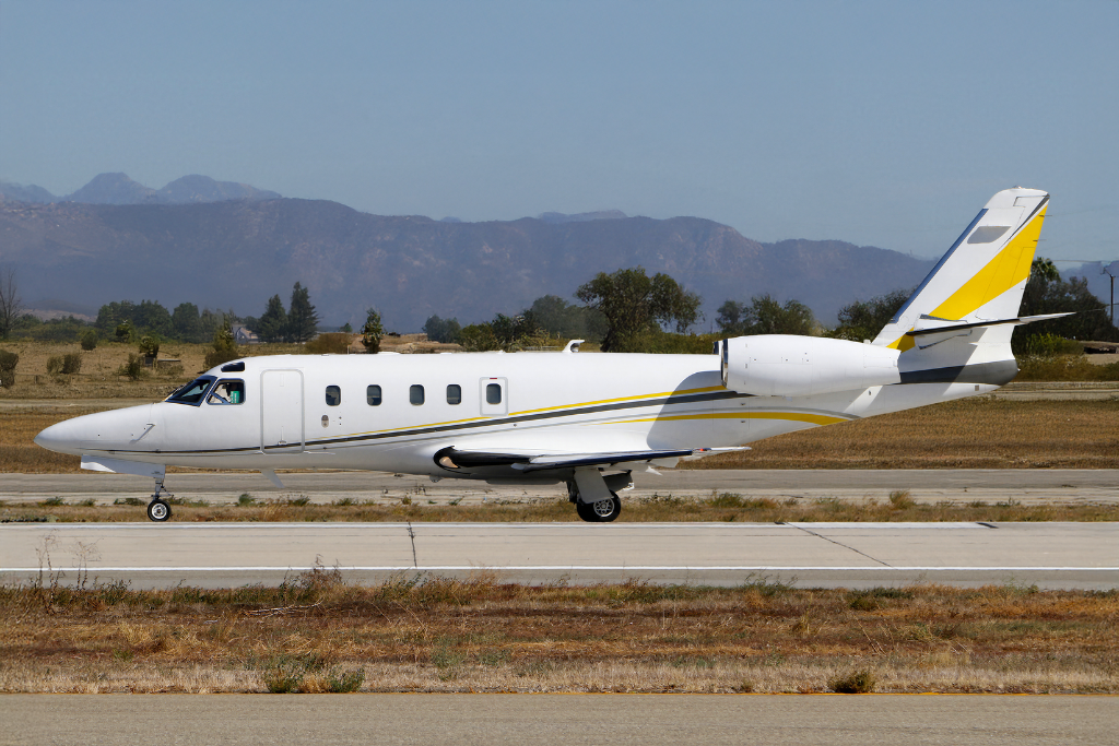 Astra light private jet on an executive ramp